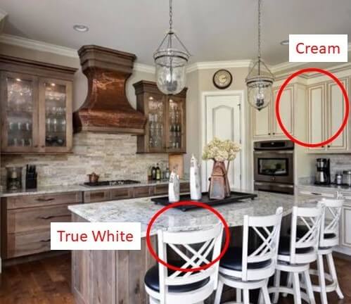 Kitchen Space Before with true white bar/counter stools and cream cabinetry